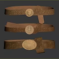 Brown Leather Belts With Intricate Embossed Patterns And Round Decorative Buckles