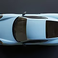 Light Blue Sports Car With Two Door Coupe Design Black Accents And Red Brake Calipers