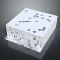 White Cube Shaped Architectural Component With Hollowed Out Hexagonal Holes And Geometric Patterns