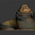Detailed Alien Creature Sculpture With Golden Green Coloration Bulbous Body And Coiled Tail
