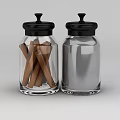 Stylish Kitchen Glass Jars With Black Lids Containing Cinnamon Sticks And Spices