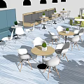 Casual Café Space With Round Tables Green White Chairs And Black Pendant Lights