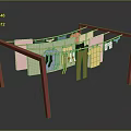 Red Clothes Drying Rack With Hanging Shirts Pants And Socks For Home Use