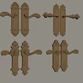 Golden Ornate Door Handles with Intricate Carving and Classic Design Style