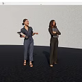 Two Women Wearing Blue And Black Jumpsuits Holding Folders In Presentation Space