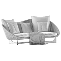 Curved Multi Person Sofa with Woven Frame Gray Cushions Green Pillows and Plaid Blanket