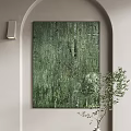Green Abstract Painting Hanging On Wall With Wall Lamp And Plant