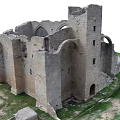 Ancient Building Ruins With Medieval Stone Walls Arched Openings Surrounded By Grass