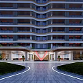 Modern High Rise Building Entrance With Red V Shape Accent Green Plants And Stone Pathway