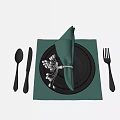 Dinnerware Set With Green Napkin Black Cutlery Stacked Plates Decorative Flower On Green Placemat
