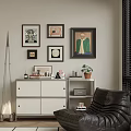 Modern Console Sideboard In Living Room With Framed Art Potted Plant And Decorative Books