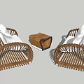 Modern Wicker Landscape Seats With White Cushions And Wooden Coffee Table
