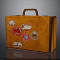 Vintage Orange Suitcase With Colorful Travel Stickers And Leather Handle