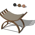 Light Gray Upholstered Wooden Stool With Curved Legs And Black Brown Wooden Balls Above