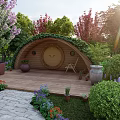 Dome Shaped Wooden Home with Green Roof Round Door Wooden Deck and Chair on Porch
