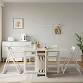 Minimalist White Dining Table And Chairs Set With Decorative Items In Bright Living Room