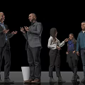 Group of Business People Standing and Conversing in Black Background Setting