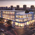 Modern Commercial Complex Glass Facade With Evening Lighting Pedestrians Cars And Shops On Street