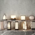 Modern Outdoor Lights With Diverse Designs And Various Shapes On Marble Surface