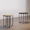 Modern Round Stools with Wooden Seat and Black Metal Legs in Interior Space