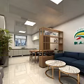 Comfortable Staff Lounge Area With Blue Sofa Marble Coffee Tables And Wooden Bookshelf
