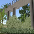 Commercial Landscape Featuring Concrete Viaduct Tall Columns Palm Trees Lush Bushes And Blue Sky