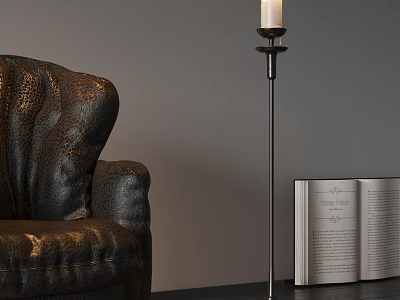Elegant Candle Lamp Beside Black Leather Sofa and Open Book in Interior 3d model