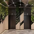 Elevator Lobby Featuring Green Plant Wall Display Screen Wooden Decor And Geometric Ceiling
