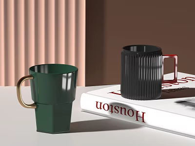 Green Double Layer Cup With Gold Handle And Black Vertical Striped Cup On Magazine 3d model