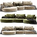 Cozy Modular Sofa In Green And Beige With Pillows And Blankets