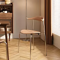 Modern Dining Chair With Curved Wooden Backrest Seat And Metal Legs By Window