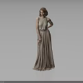 Woman In Long Beige Dress Standing Elegantly With Gray Background And Reflective Floor