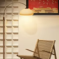 Woven Floor Lamp Lights Up Room With Rattan Chair And Wall Art