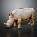 White And Yellow Rhinoceros Sculpture With Red Spots Standing On Dark Background With Reflection