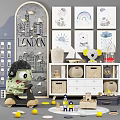 Green Monster Stuffed Toy in Kids Room with Decorative Wall Art Storage Cabinet and Building Blocks
