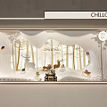 CHILLCHAN Window Display Featuring Wavy White Design Golden Trees Deer Figurines And MY MO Logo