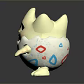 Cute Yellow Game Character Emerging From Cracked Egg With Colorful Patterns 3d model