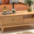 Natural Wooden Coffee Table With Drawers Decorative Items And Wicker Stools In Cozy Living Room