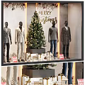 Christmas Window Display With Mannequins In Stylish Outfits Christmas Tree Gift Boxes And 20 Percent Off