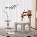 White Leisure Chair With OK Gesture Backrest In Modern Room With Green Plant Side Table