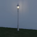 White Outdoor Street Lamp Post Illuminated On Grass With White Wall Background