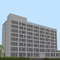 Modern White Multi Story School Building With Many Windows And Green Trees Lawn