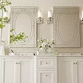 White Double Sink Bathroom Vanity with Marble Countertop Oval Mirrors Wall Sconces and Beige Wall
