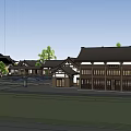 Traditional Commercial Street With Black Rooftops Well Arranged Buildings And Green Trees