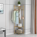 Gold Metal Clothes Rack With Hanging Clothes And Handbags Storage Basket In Modern Bedroom Interior
