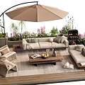 Comfortable Outdoor Sofa Setup with Armchairs Coffee Table Parasol Grill and Green Plants