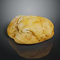 Natural Yellow Stone With Surface Cracks On Black Background And Reflection