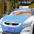 BYD Blue And White Taxi With License Plate Parked In Urban Area