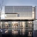 Modern Sales Office Building Featuring Glass Facade Metal Panels And Reflective Water Pool