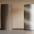 Two Decorative Columns With Brown Twisted Texture And Silver Perforated Design 3d model